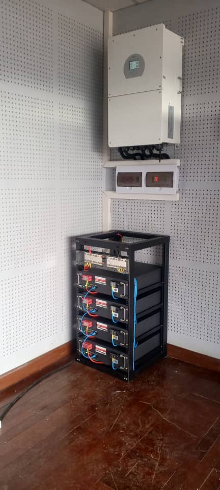 Hybrid inverter with rack-mounted battery bank